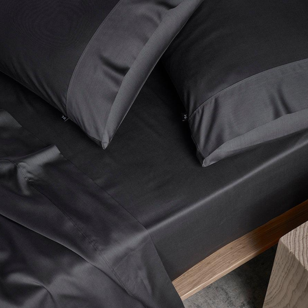 The Honest Label Graphite Cooling & Antimicrobial Sheet Set in Charcoal with grey tones sheet set product view THL product image 4