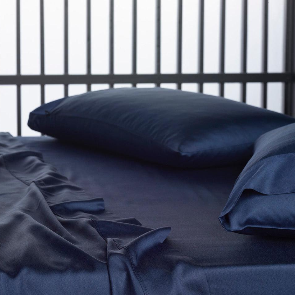 The Honest Label Graphite Cooling & Antimicrobial Sheet Set in Midnight with grey tones sheet set product view THL product image 1