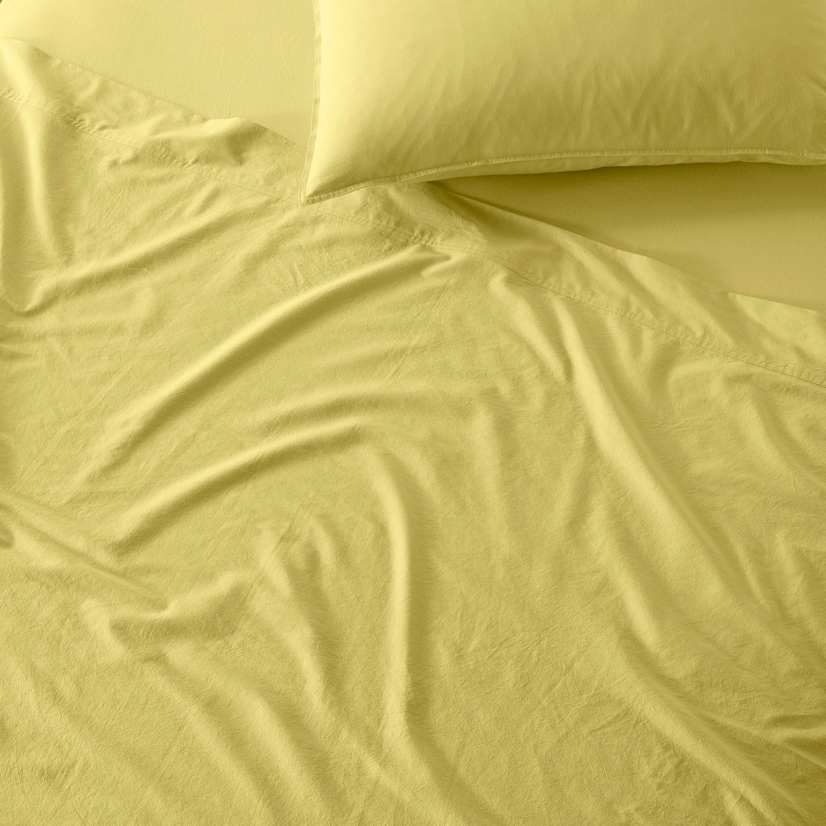 The Honest Label Washed Cotton Flat Sheet in Butter with yellow tones flat sheet product view THL product image 2