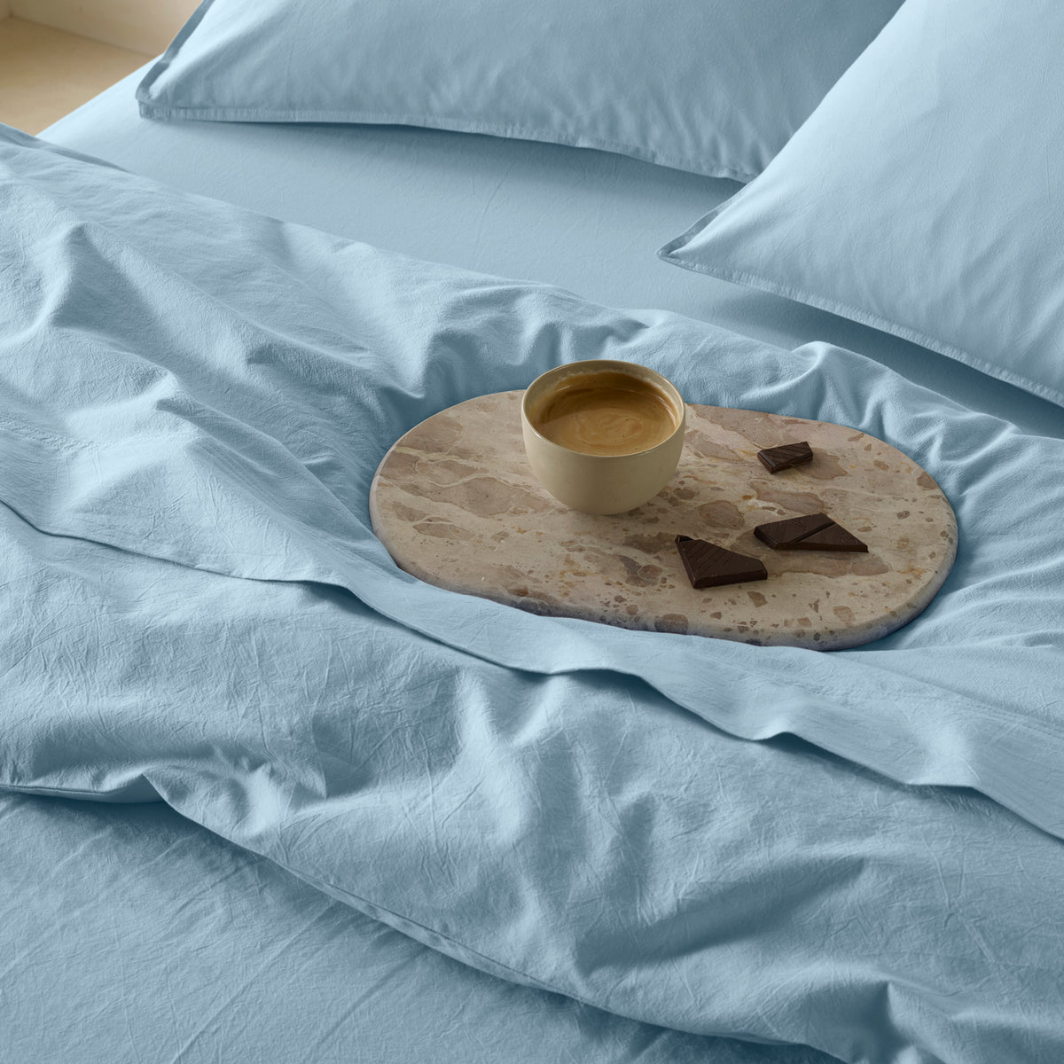 The Honest Label Washed Cotton Standard Pillowcase (2 Pack) in Skye with blue tones pillowcase product view THL product image 2