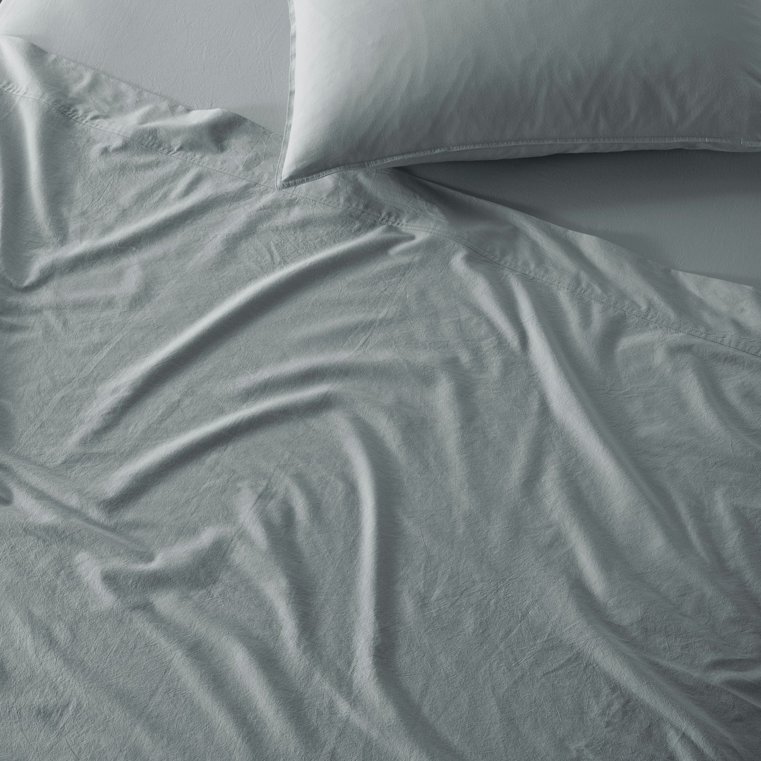 The Honest Label Washed Cotton Flat Sheet in Slate with grey tones flat sheet product view THL product image 2