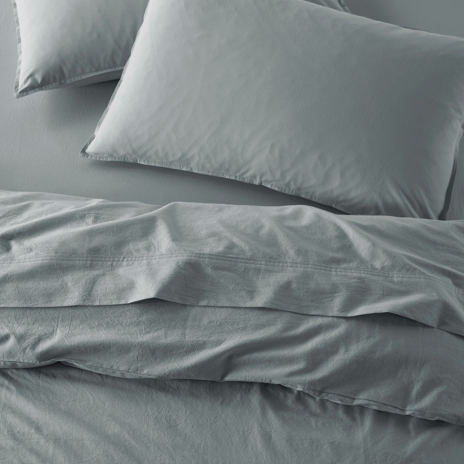 The Honest Label Washed Cotton Flat Sheet in Slate with grey tones flat sheet top view
