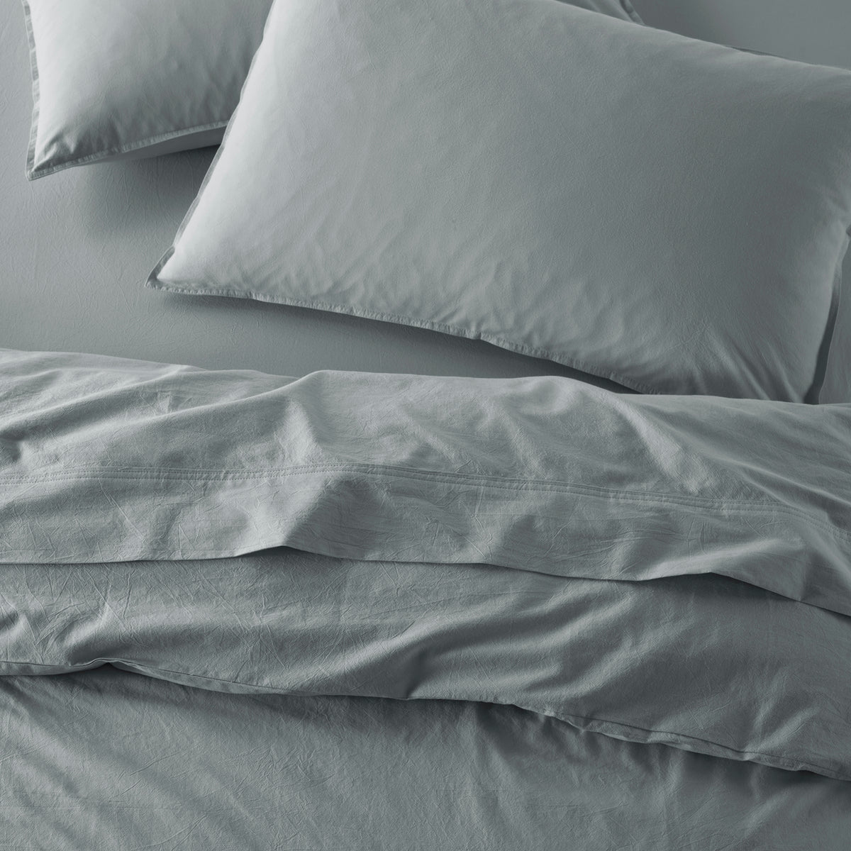 The Honest Label Washed Cotton Flat Sheet in Slate with grey tones flat sheet top view