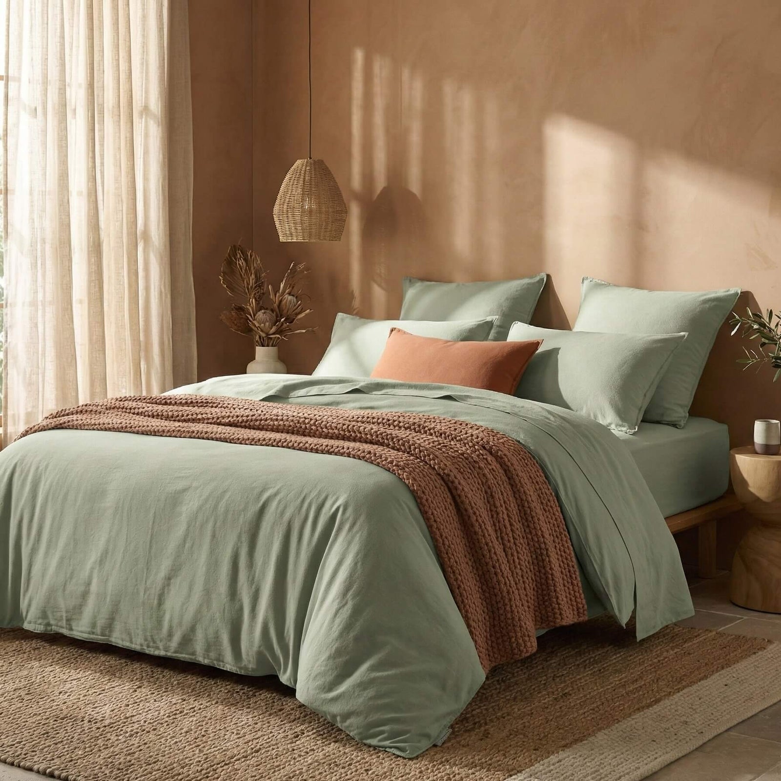 The Honest Label Washed Cotton Quilt Cover in Sage with green tones quilt cover styled bedroom view