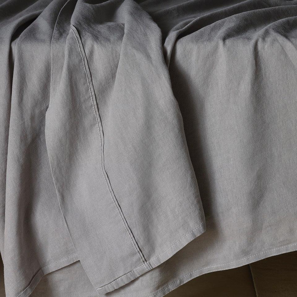 The Honest Label Pure Linen Flat Sheet in Light Grey with grey tones flat sheet close up detail