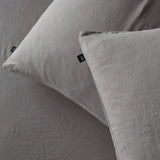 The Honest Label Pure Linen Standard Pillowcase (2 Pack) in Light Grey with grey tones pillowcase close up detail THL product image 1