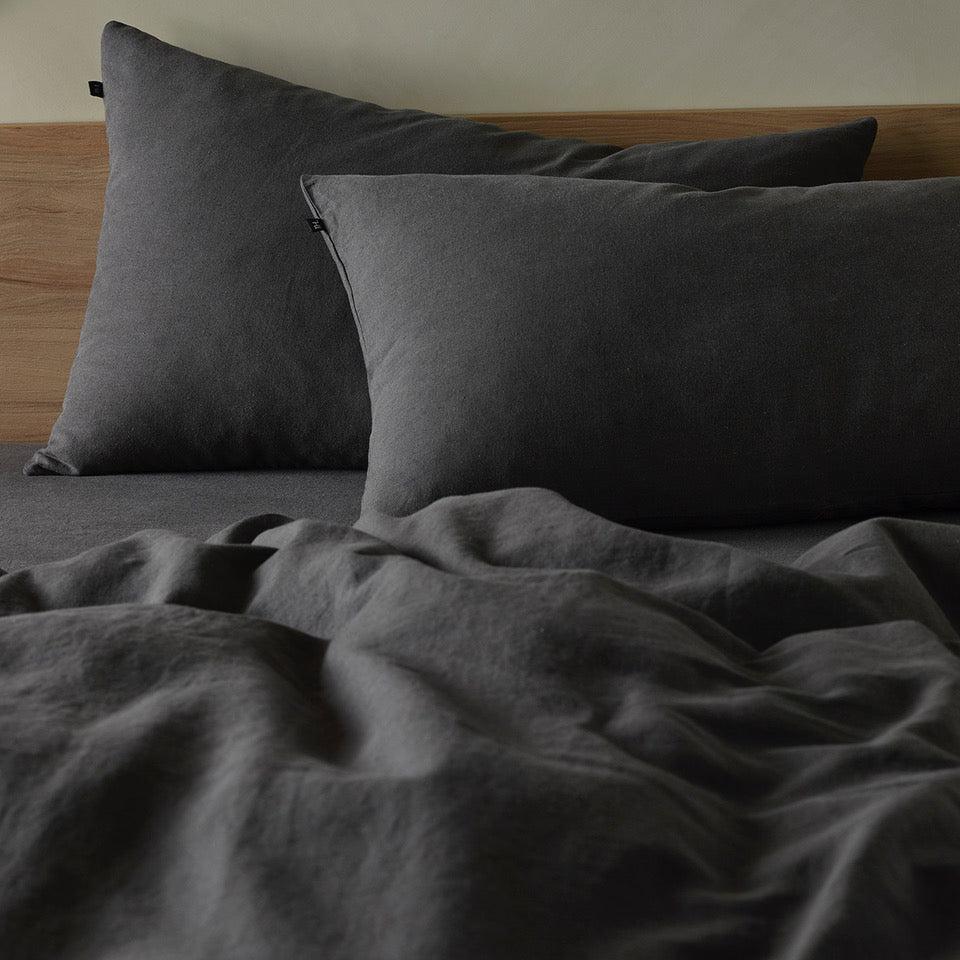 The Honest Label Pure Linen Standard Pillowcase (2 Pack) in Charcoal with grey tones pillowcase product view THL product image 2