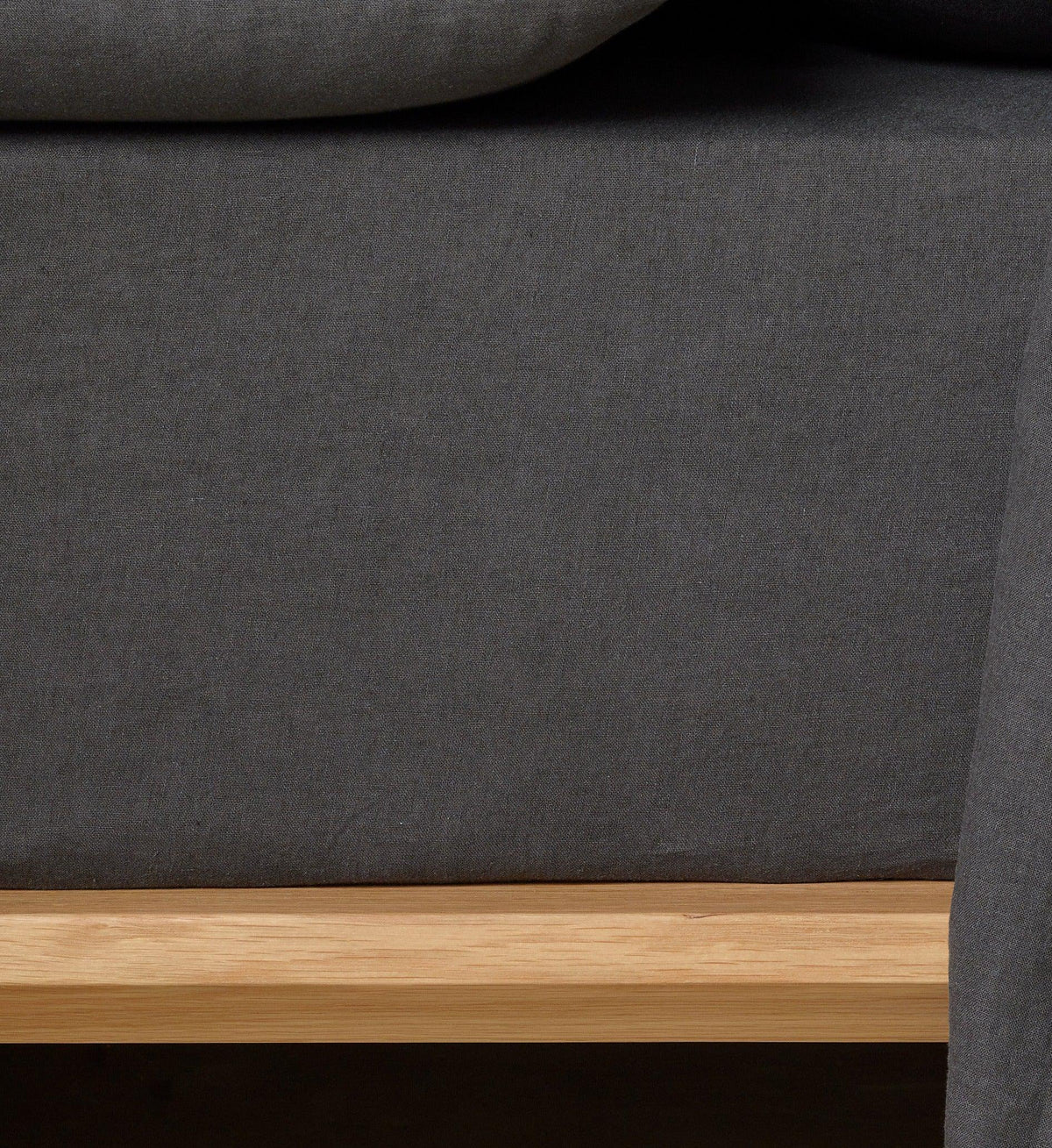 The Honest Label Pure Linen Fitted Sheet in Charcoal with grey tones fitted sheet product view THL product image 1