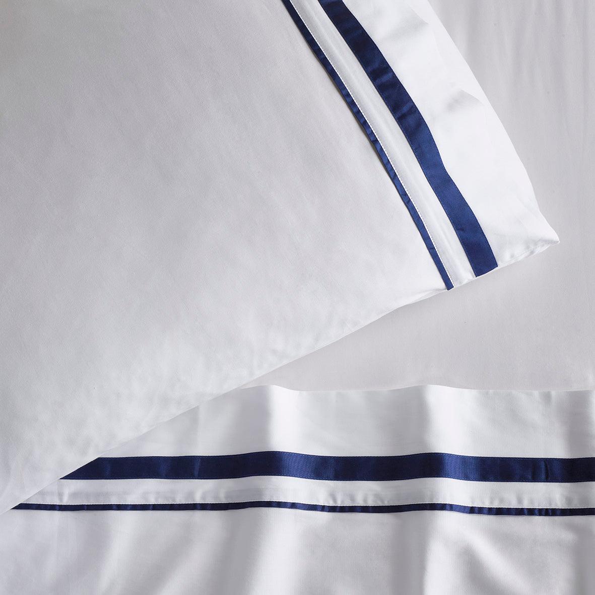 The Honest Label Organic Cotton Sheet Set with Trim in Navy with blue tones sheet set product view THL product image 1
