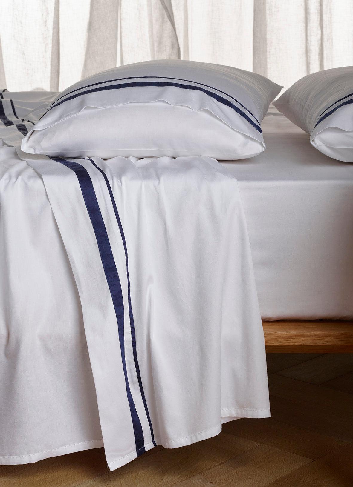 The Honest Label Organic Cotton Sheet Set with Trim in Navy with blue tones sheet set product view THL product image 2