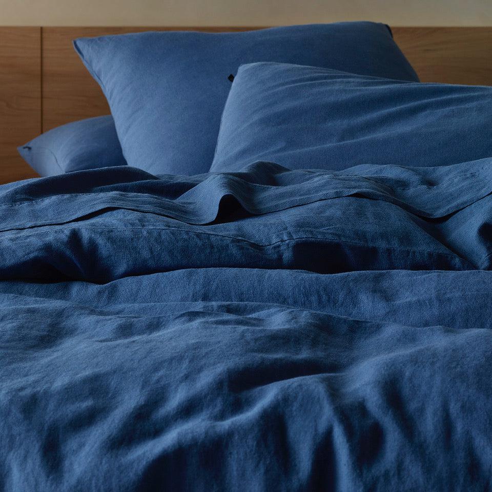 The Honest Label Pure Linen Quilt Cover Set Incl Pillowcases in Ocean Blue with blue tones pillowcase close up detail THL product image 2
