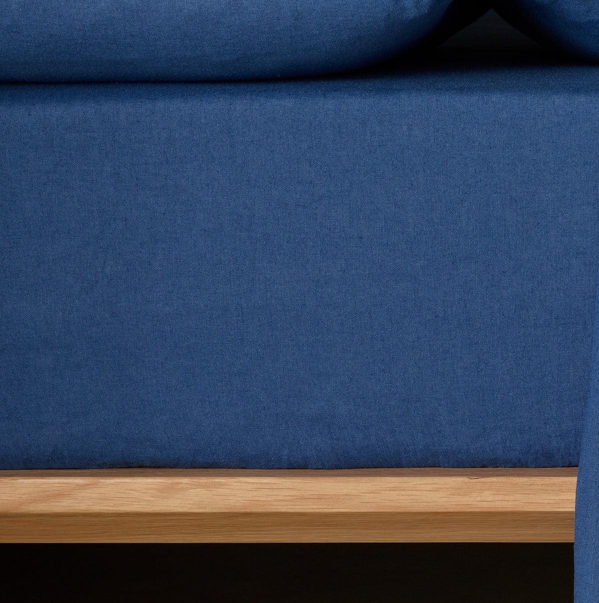 The Honest Label Pure Linen Fitted Sheet in Ocean Blue with blue tones fitted sheet close up detail THL product image 1