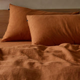 The Honest Label Pure Linen Standard Pillowcase (2 Pack) in Red Earth with red tones pillowcase product view THL product image 2