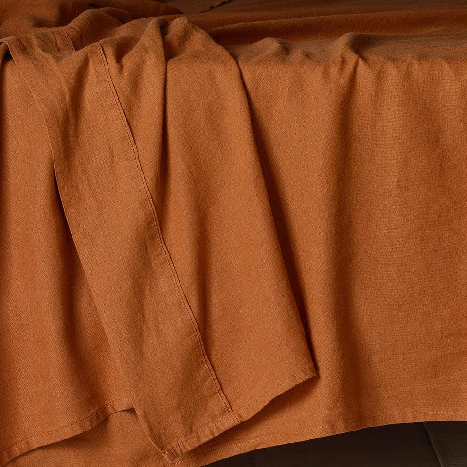 The Honest Label Pure Linen Flat Sheet in Red Earth with red tones flat sheet product view THL product image 3