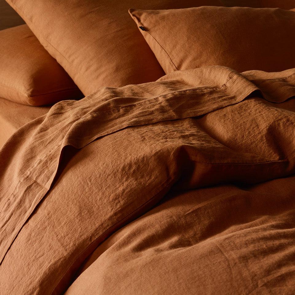 The Honest Label Pure Linen Quilt Cover Set Incl Pillowcases in Red Earth with red tones pillowcase product view THL product image 1