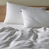 The Honest Label Pure Linen Standard Pillowcase (2 Pack) in Ivory White with white tones pillowcase product view THL product image 2